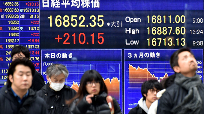 Tokyo stocks close higher with eyes on vaccine news