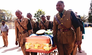 Slain cop: Suspects quizzed
