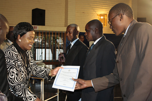 Company donates cash, computers to CID