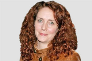 Ex-editor arrested in phone-hacking scandal
