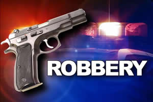Family robbed US$1800, cellphone