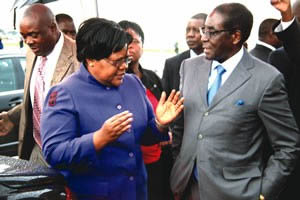President Mugabe back from Singapore