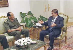 Egypt president sweeps out army rulers