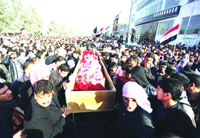 Iraqi Sunnis mourn protesters shot dead by troops