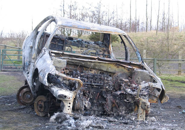 21 vehicles reduced to a shell as veld fire spreads to garage