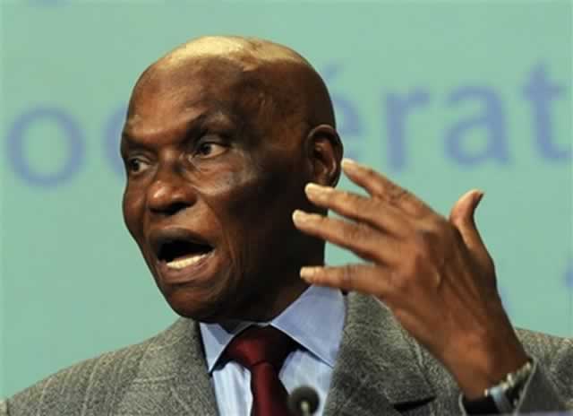 Wade accuses Dakar of homecoming delay
