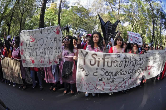 Thousands march in Mexico over students