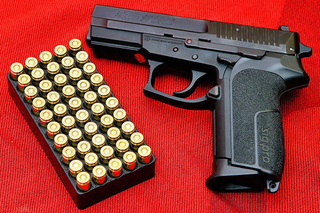Man pumps 5 bullets into wife as kids watch