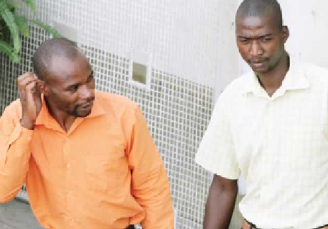 ‘Cops’ in court for $1, cigarette extortion