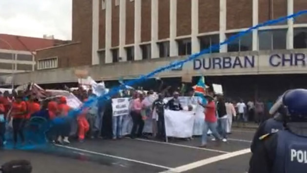 Calls for calm after foreigners, police clash in Durban