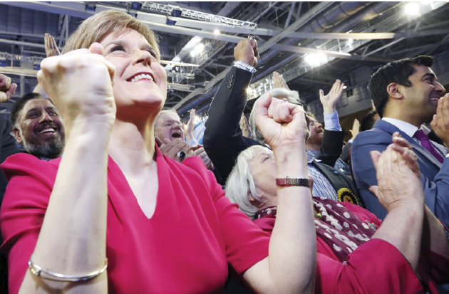 Cameron wins British election with slim majority