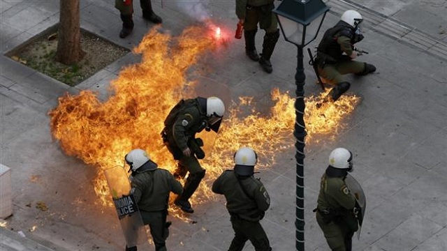 Mass rally, clashes shut down Greece