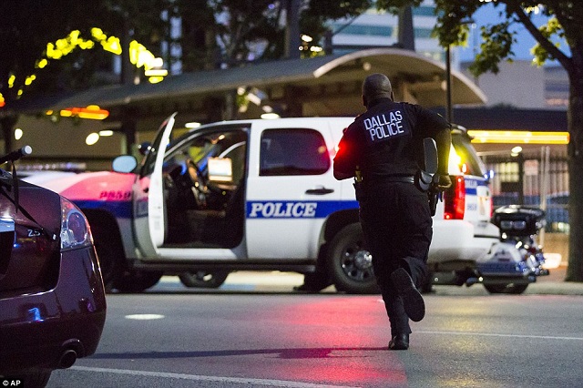 Snipers shoot 5 cops dead in protest over blacks killing