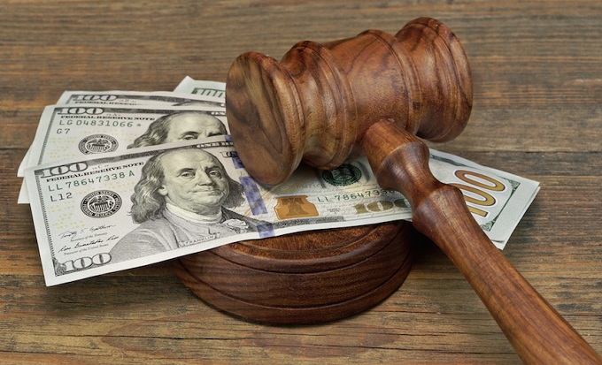 The cop is facing fraud charges