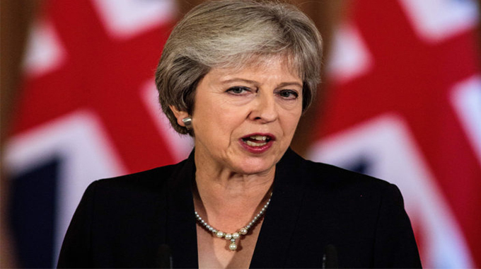 Bid to topple British PM May falters