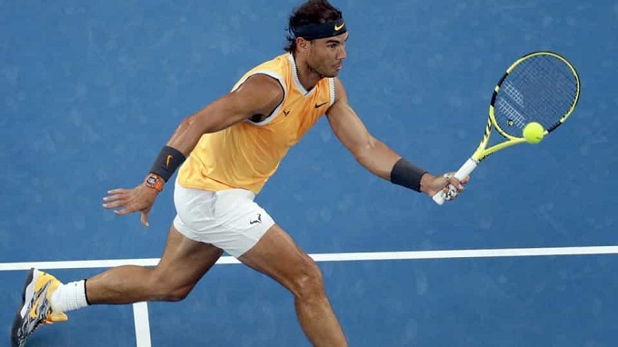 Ruthless Nadal romps past De Minaur