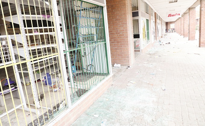 Businesses start repairing damaged buildings