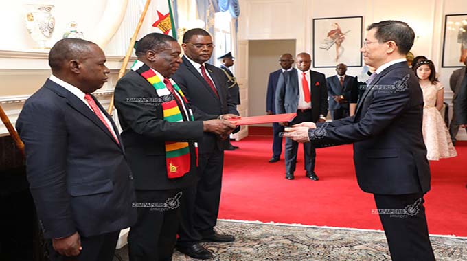 Five envoys present credentials