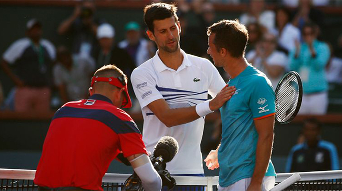 Djokovic beaten by Kohlschreiber in third round