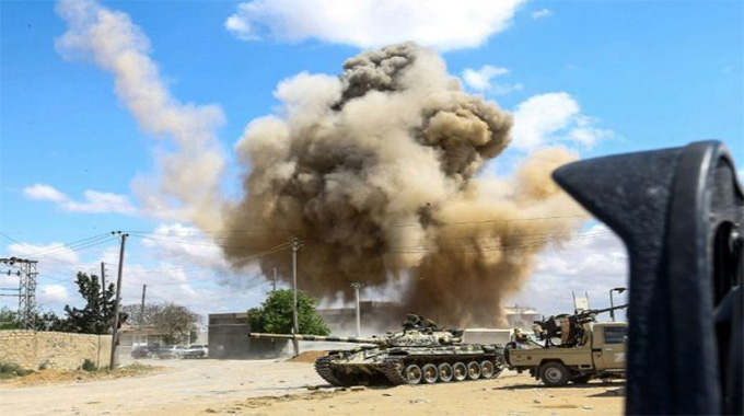Tripoli quiet after air raid, death toll rises