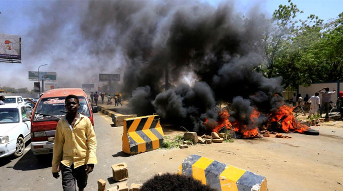 Violence flares after deal on Sudan power structure