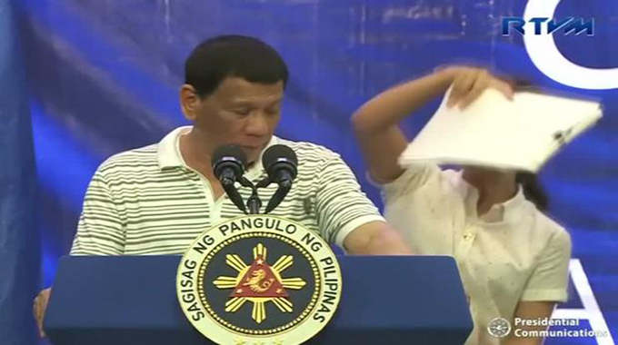 Philippine leader brushes off finger-sized coackroach