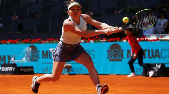 Halep beats Bencic to reach fourth Madrid Open final