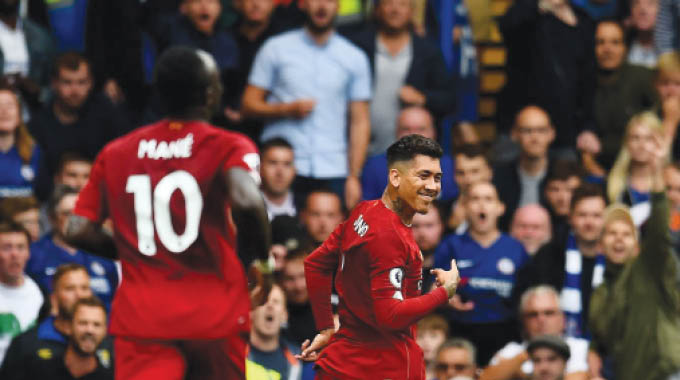 Liverpool down Chelsea to extend perfect start