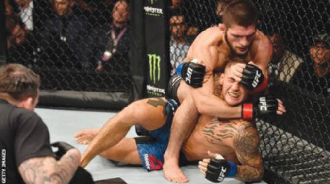 Khabib Nurmagomedov defeats Dustin Poirier by submission