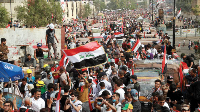 Iraq forces fire live rounds at protesters