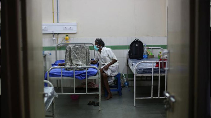 Doctors rush to India town where 100 children died in hospital