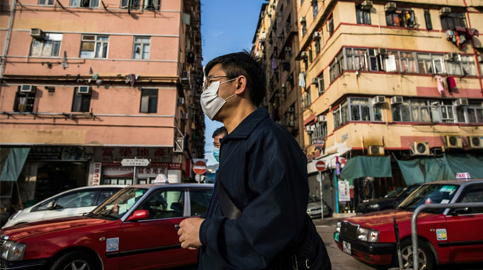 China coronavirus cases rise, as Trump urges calm after US death