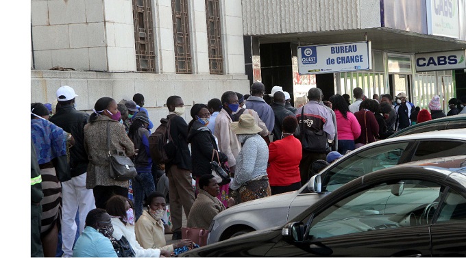 Social distancing fails as queues grow