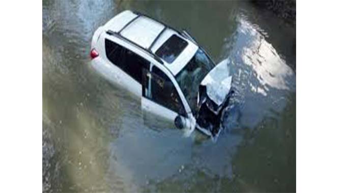 Three dead after car swept away