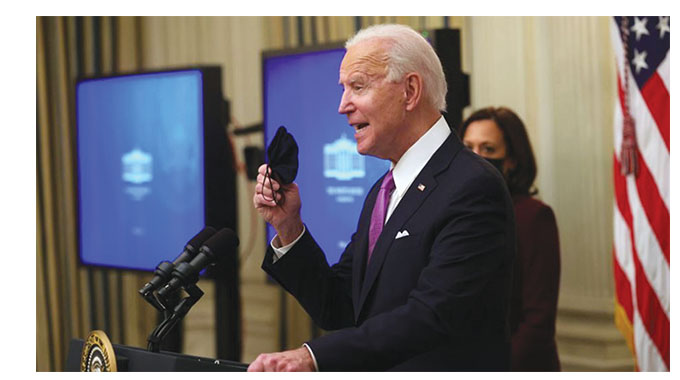 Biden signs Covid-19 orders