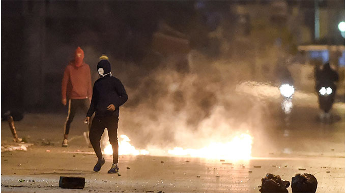 Tunisia rioters clash with security forces for third night