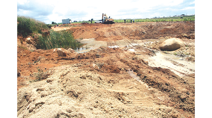 Council covers ‘death pits’
