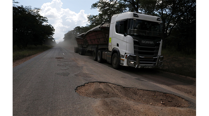 Truck runs over passenger