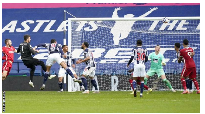 Goalkeeper’s stoppage time header keeps Liverpool in top four run