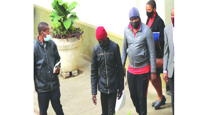 Armed robbers appear in court, remanded in custody