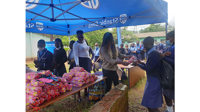 Stanbic Bank donates sanitary wear to 775 school girls