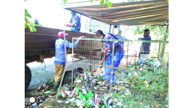Mpofu a proud garbage collector