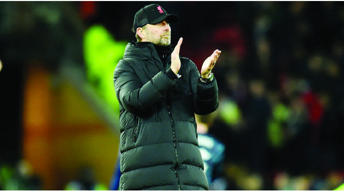 Klopp plays down talk of Liverpool quadruple