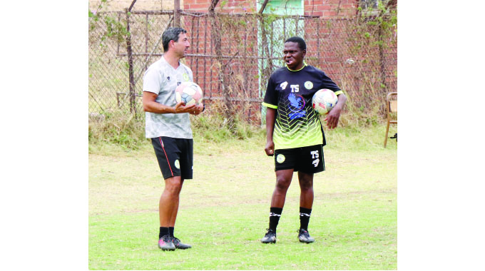Chiefs coach back at training