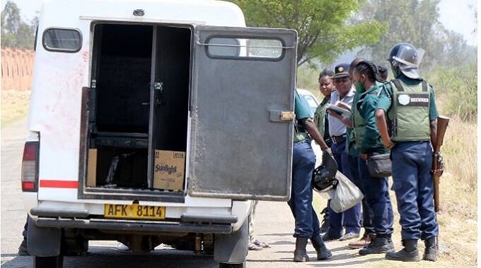 13 armed robbers get away with How Mine gold