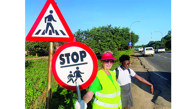WATCH: Everyday Heroine. . . Bulawayo woman dedicates mornings to helping kids cross the road