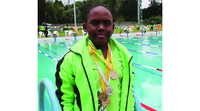 Weight loss plan births champion swimmer