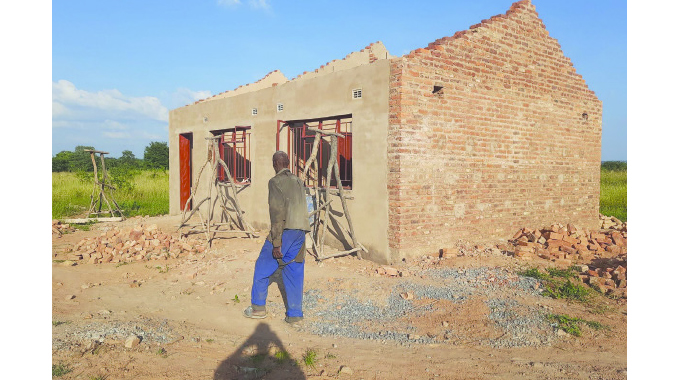 Relocated Binga families’ homes near completion