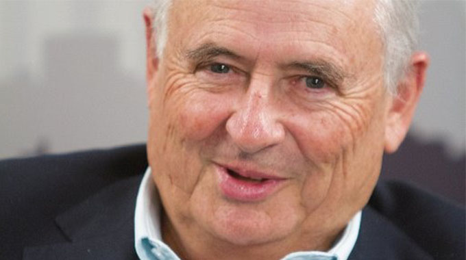 Premier re-elects George Roach as director