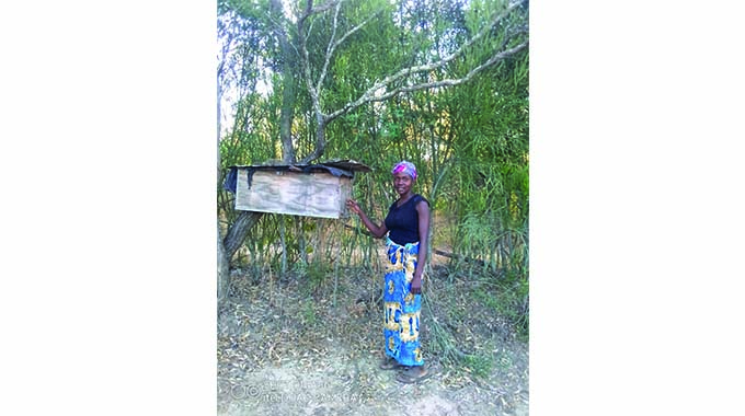 Beekeeping project empowers young woman
